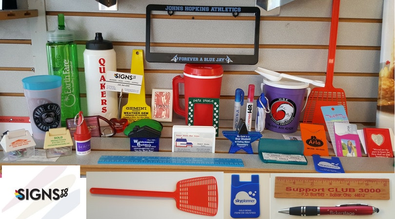A collection of promotional materials on a table.