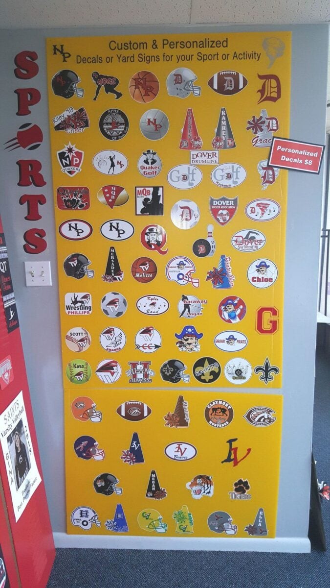 A display of assorted sport team decals.