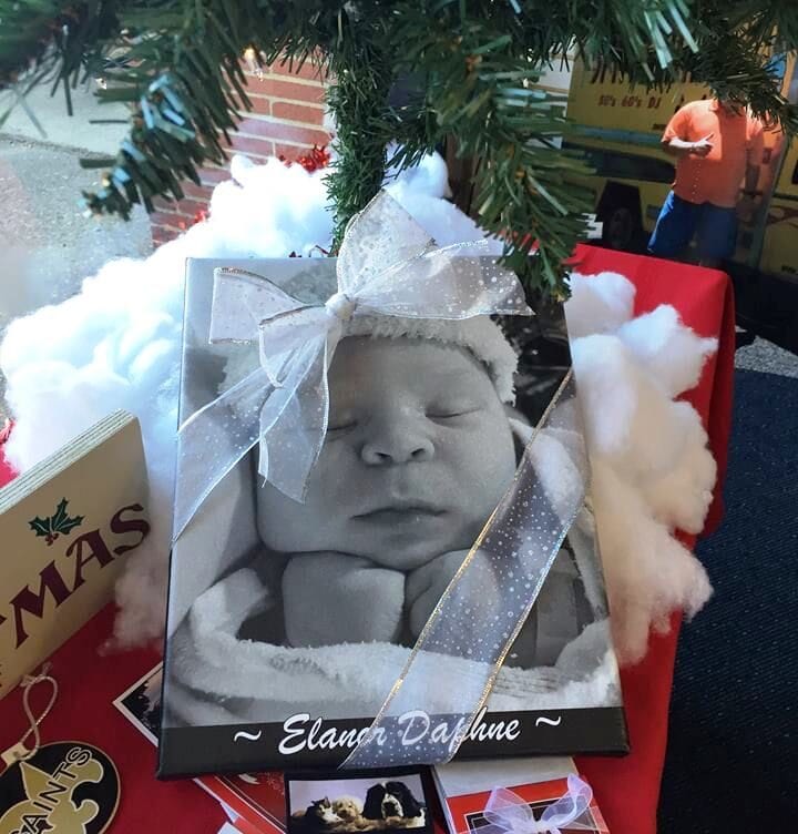 Photo of a baby printed onto a box.